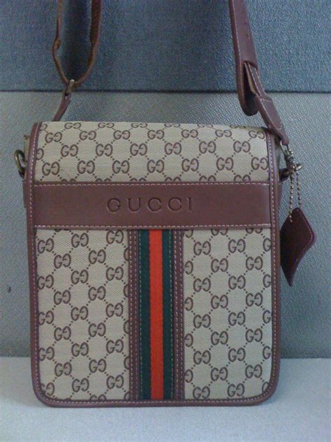 mariconeras gucci originales para hombre|farfetch gucci cartera.